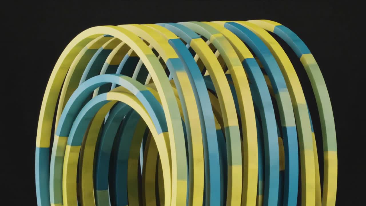 Concentric segmented arches rotating on playback in motion graphics, showcasing yellow teal pattern