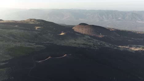 Sunset-Glow-over-Sicilian-Volcanic-Craters,-Italy---aerial-fly-over