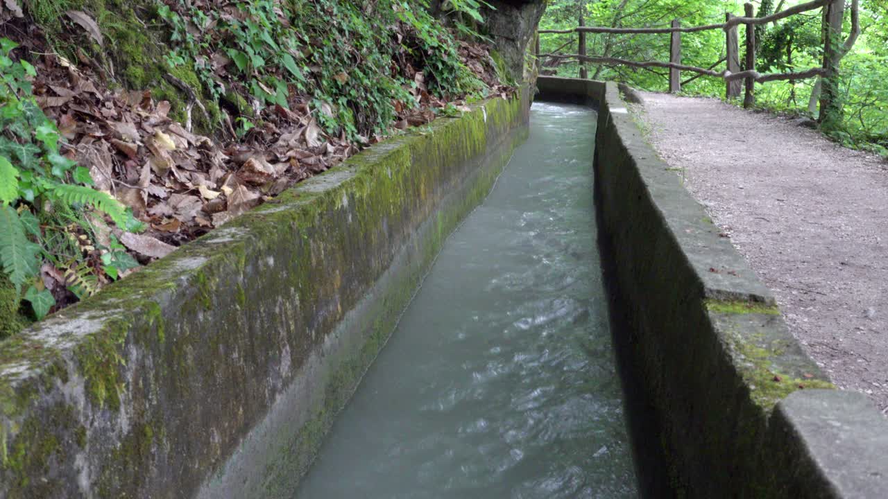 Part of a man-made irrigation canal used for agricultural purpose along a hiking path