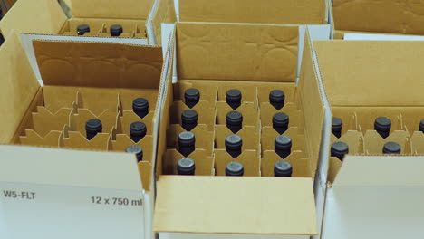 Packaging-Bottle-With-Alcohol-In-Cardboard-Box