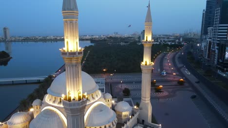 drone camera view of sharjah's iconic al noor mosque in the united arab emirates