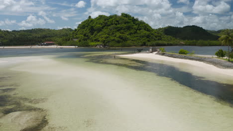 Aerial-showing-old-broken-bridge-at-Doot-Beach-nearby-General-Luna,-Siargao-Island,-Philippines