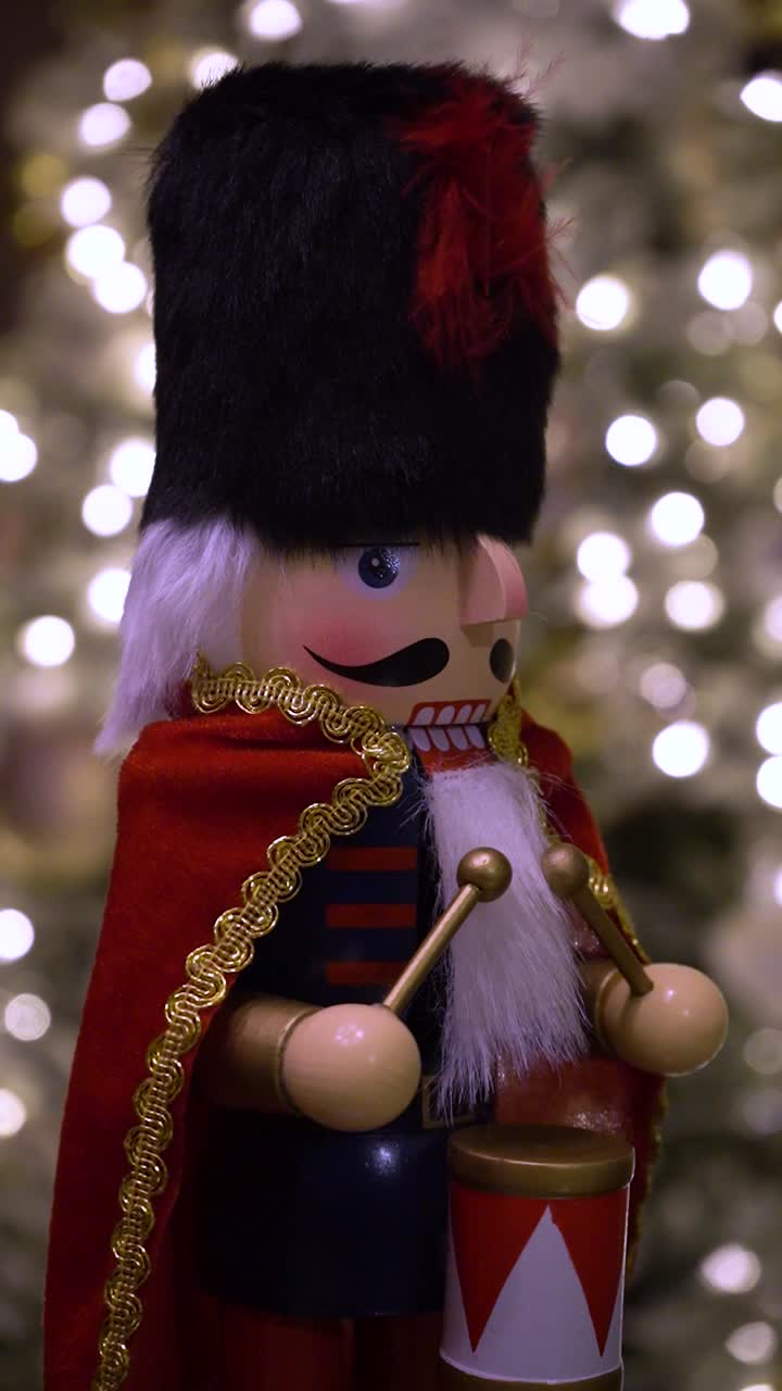 Extreme close-up shot of traditional wooden nutcracker figurine, classic Christmas decorative collectible, isolated against softly blurred background