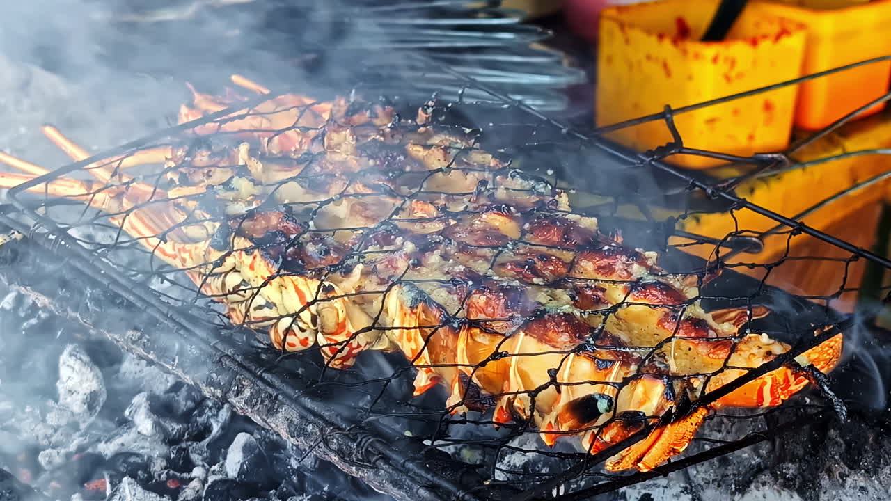Grilling Lobster Over Charcoal At Kedonganan Fish Market In Bali, Indonesia. - closeup shot