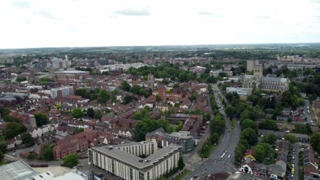 rotating around norwich city wide aerial footage highlights the city's architecture including cathedral, mall and center homes including blocks of flats.