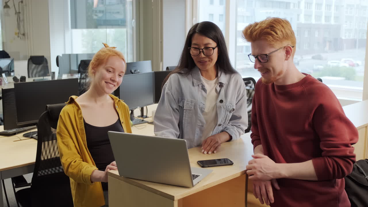 Friendly Coworkers Discussing Project