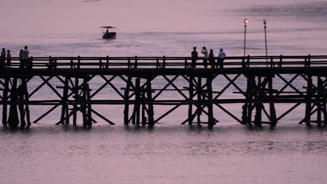 The-Mon-Bridge-is-an-old-wooden-bridge-located-in-Sangkla,-Thailand