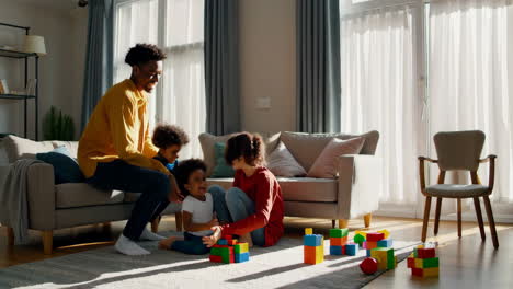 happy family playing and jumping in the living room