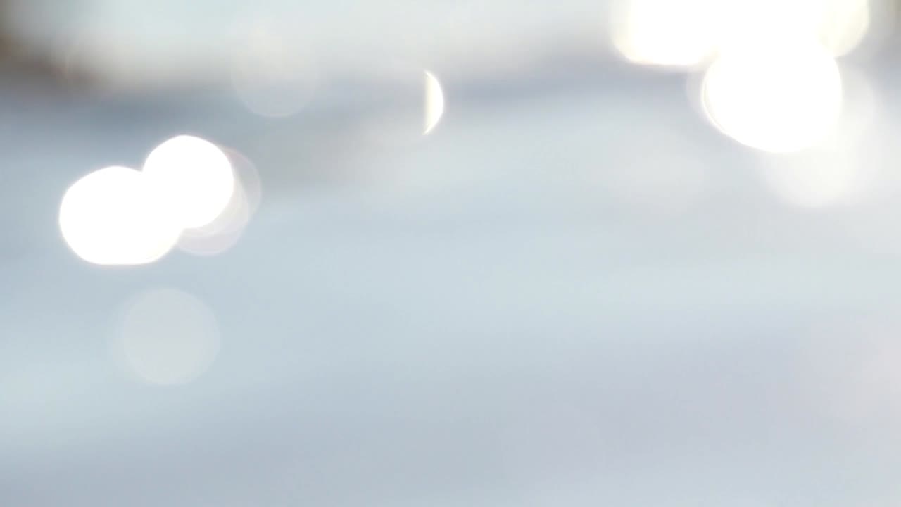 추상적인 흐릿한 바물 배경과 반이는 빛 보케