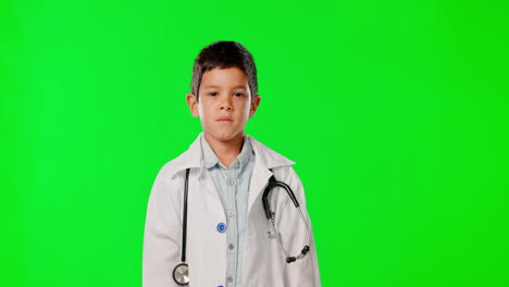 doctor, green screen and a child pointing to space