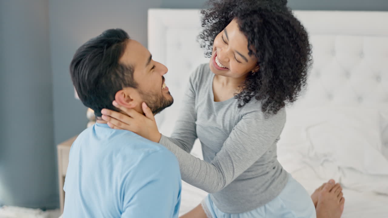 Love, flirting and laughing bedroom couple