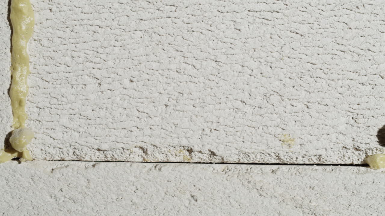 Close-up of a wall with construction foam