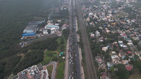 aerial drone shot of traffic on the highway chennai city