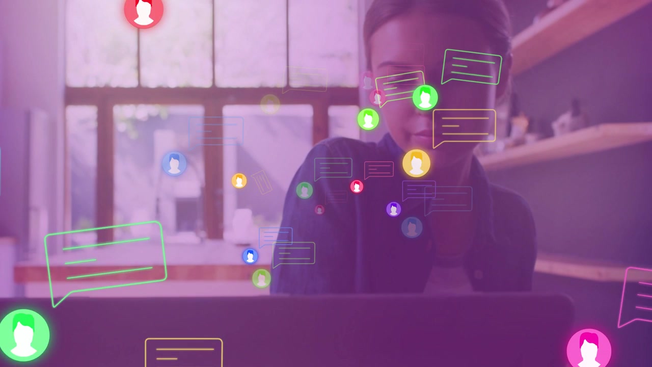 Woman leaning, writing at laptop, driving chat bubbles around while camera centering for marketing