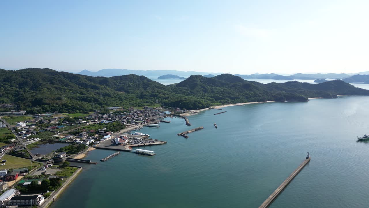 Slow rotating drone flight over Teshima art island in Japan
