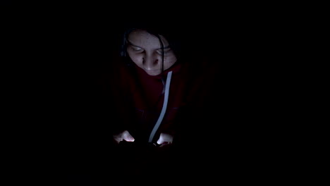 asian woman playing game on smartphone in the bed at night, people,addict social media