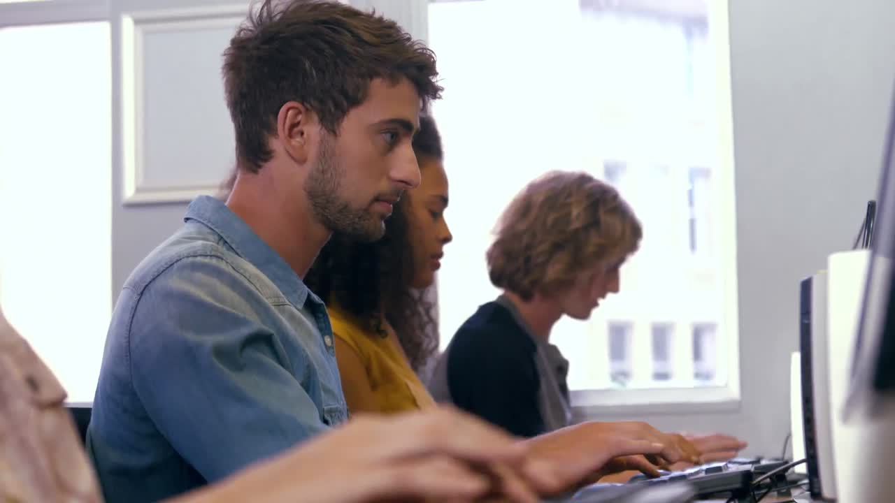 Students using computers in the computer room