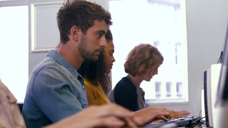Students using computers in the computer room