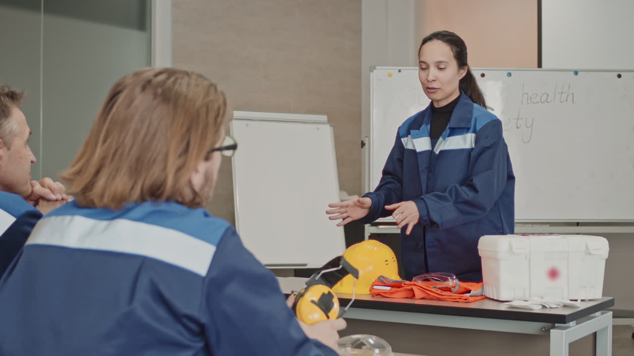 Female Supervisor Giving Lecture On First Aid At Plant Facility