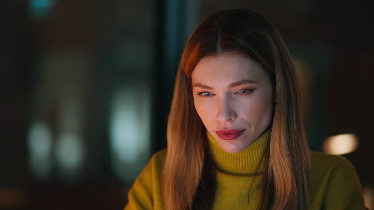 Hardworking freelancer sitting night workspace closeup. Serious businesswoman