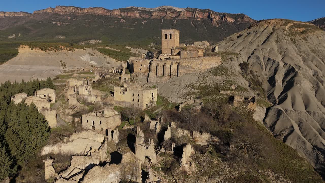 Moving forward drone movement to the Church of the abandoned village of Esc&oacute;, Spain