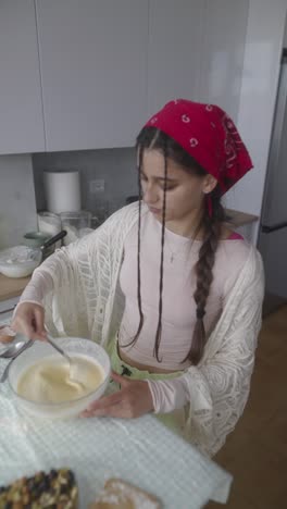 teenager baking in a kitchen