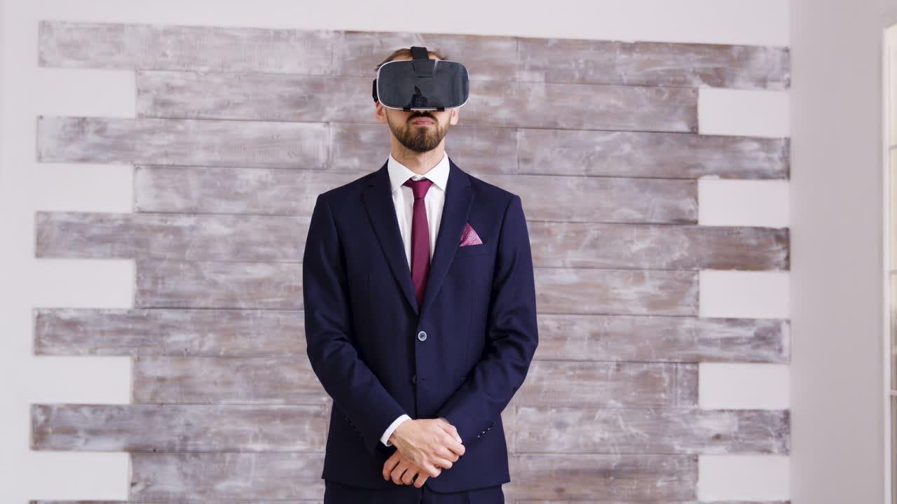 Man in suit using virtual reality headset