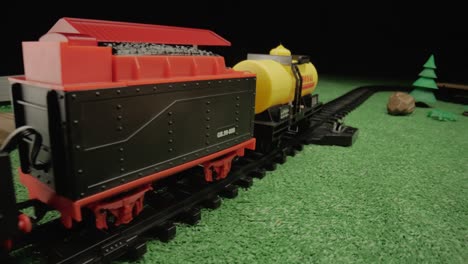 toy train set on grassy track
