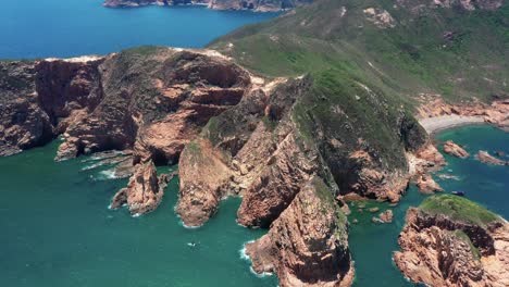 Scenic-aerial-top-view-of-dramatic-high-precipice-with-beautiful-sea-view