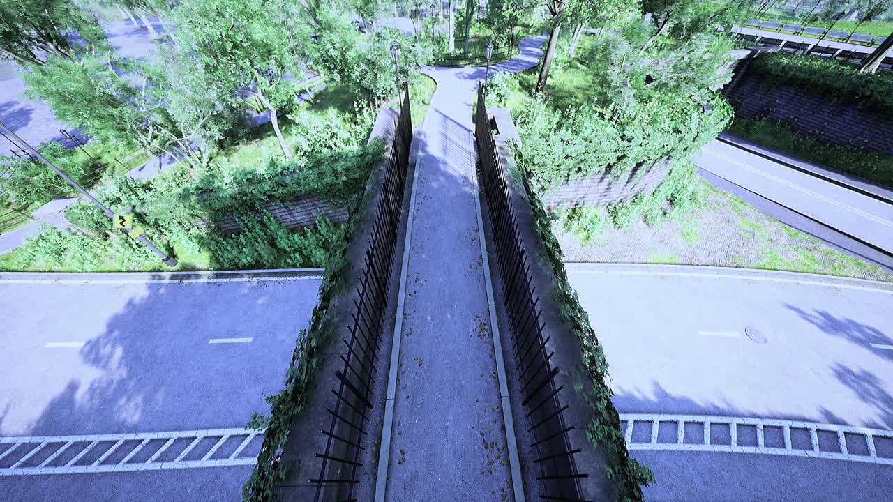 Elevated view of a peaceful green walkway surrounded by trees and roads