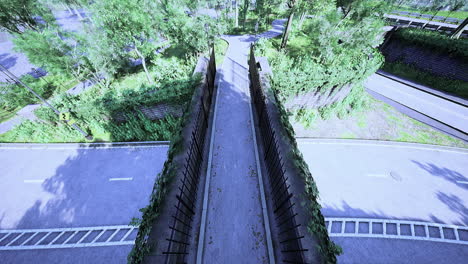 elevated view of a peaceful green walkway surrounded by trees and roads