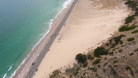 Flying-into-PCH-in-Malibu-Over-Santa-Monica-Mountains,-Pacific-Ocean-Ahead