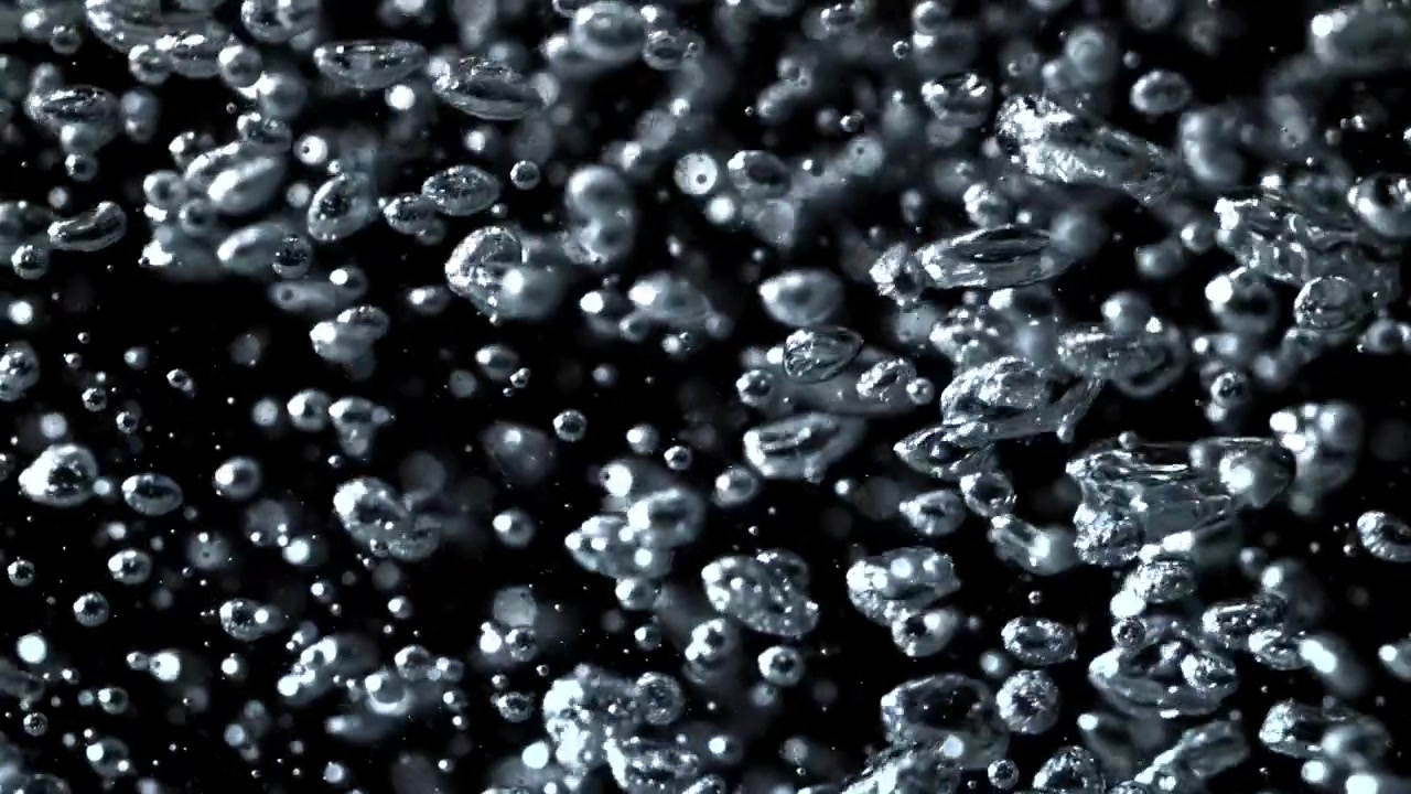 Slow Motion Waterbellen Opstijgend op Zwarte Achtergrond