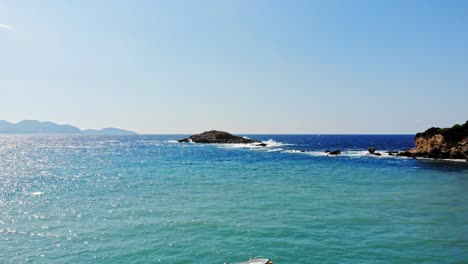 Turquoise-Ocean-Of-Jerusalem-Beach-In-Erisos,-Greece---aerial-drone-shot