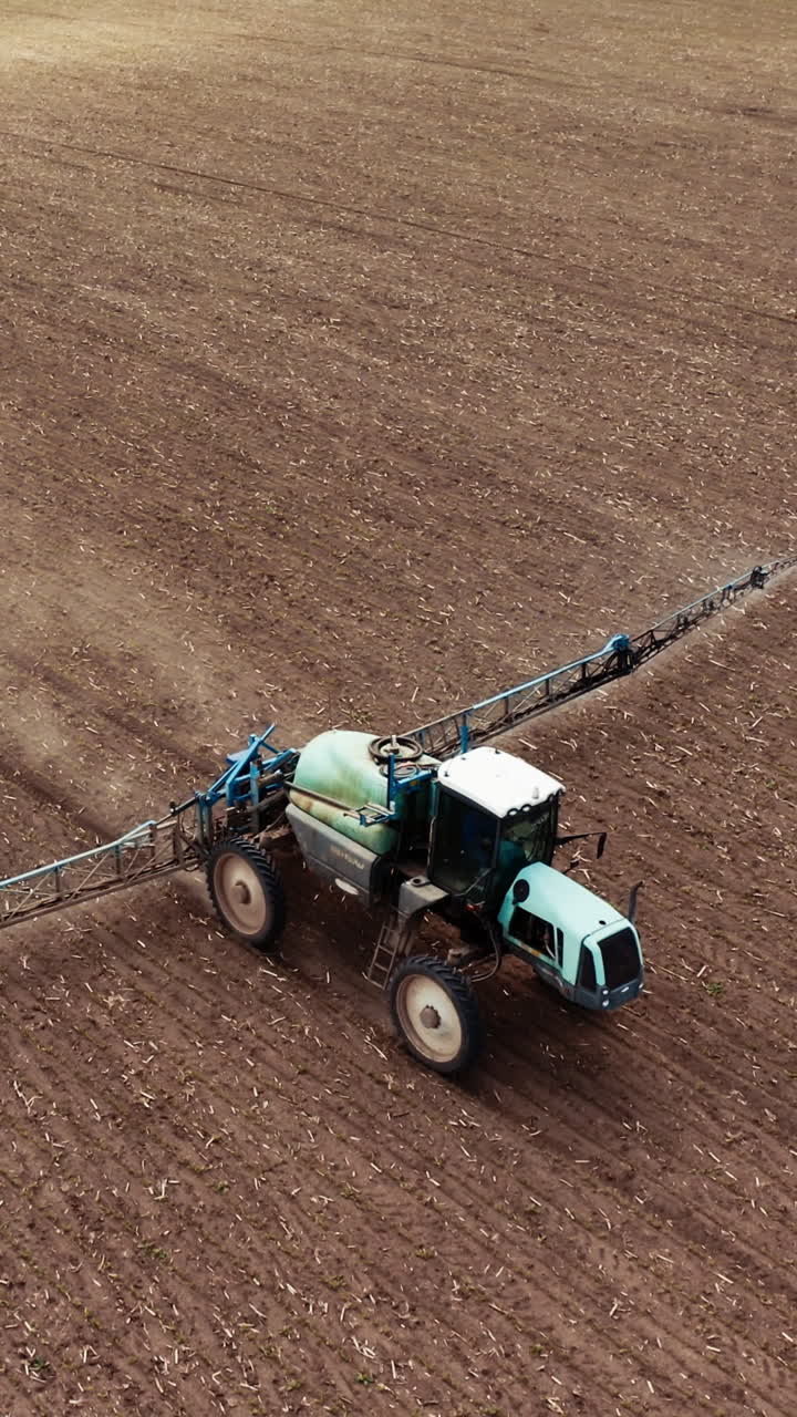 Farm machine sprayer tractor. Aerial view of modern farm machine sprayer on field