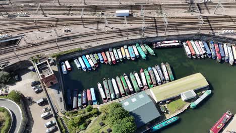 overhead birds eye drone aerial view row of canal boats st pancras basin london
