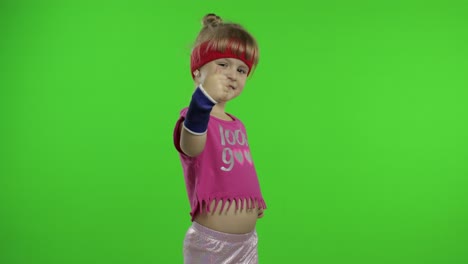 happy girl in pink sportswear showing thumb up gesture isolated on chroma key background. fitness