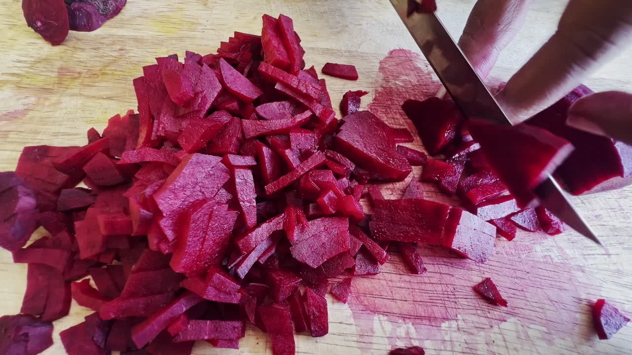 Cutting beet with sharp chef knife macro shot, cooking process, preparing ingredients for Tar Tar, slow motion, shot on Red Weapon Helium