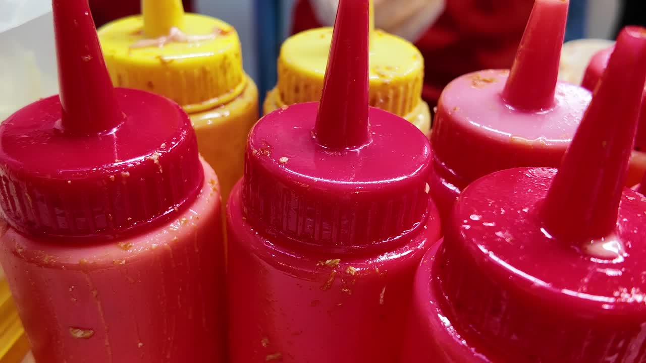 Close-up of various condiment bottles