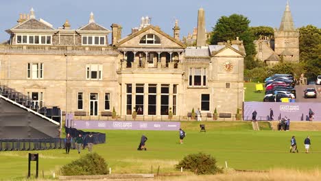 golfers playing at historic st andrews course