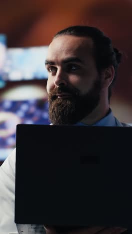 vertical video medical specialist reviewing digital diagnostics and electronic records