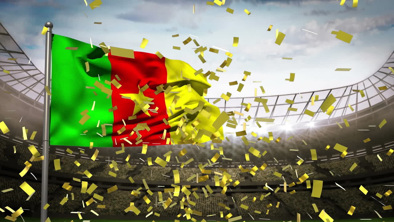 배경 에 있는 스포츠 경기장 에 맞서 카메룬  ⁇ 발 을 흔들고 있는 황금 콘페티 가 떨어지고 있다