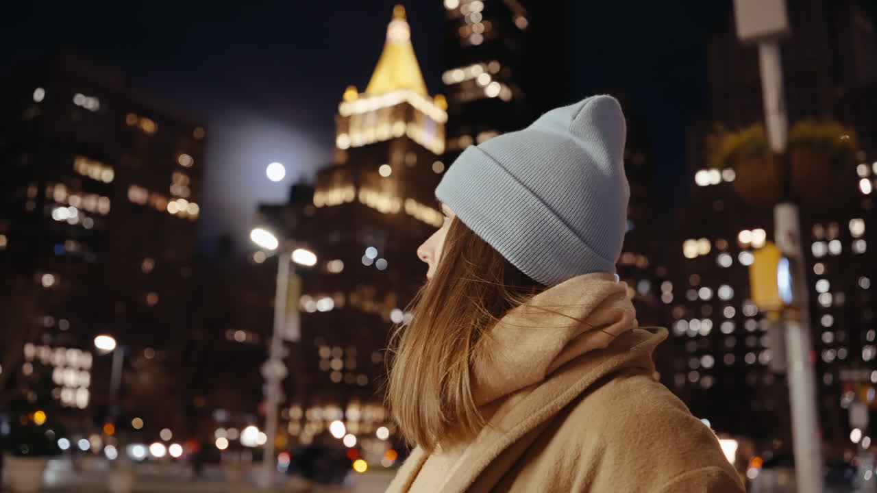 Woman in City at Night