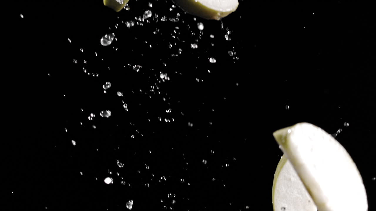 piezas de manzana voladora cámara lenta 1900fps fantasma 4k