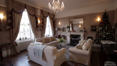 A-beautifully-furnished-Georgian-home-with-tall-ceilings,-a-fireplace,-and-large-windows