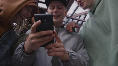 young dancers with smartphone