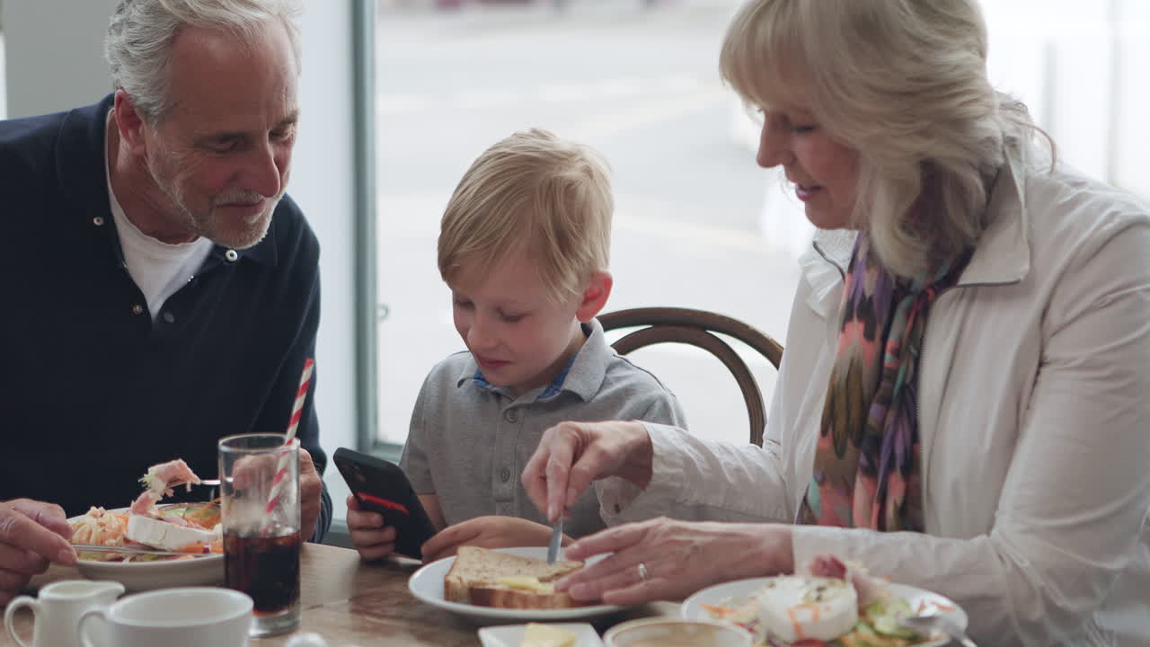 Family enjoying lunch at a restaurant