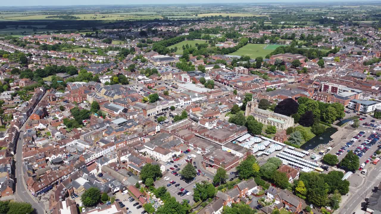 Hitchin Hertfordshire, market town England UK pull back reveal drone aerial view