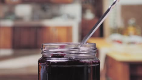 making berry jam in a kitchen