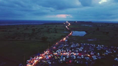 Aerial view of huge crowd going for pilgrimage to a hindu temple in rajasthan india during evening time
